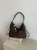 Bolsa Feminina Versátil de Camurça Vintage 2025 Nova Bolsa de Ombro para o Trabalho Grande Capacidade Bolsa Tote Transversal Venda por Atacado
