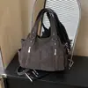 Nova bolsa tote de moda outono/inverno 2026, grande capacidade, adequada para o trabalho e para o dia a dia, bolsa de ombro estilosa e versátil