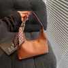 Bolsa de Braço para Mulheres 2026 Nova Tendência Fashion Versátil de Alta Qualidade Bolsa de Ombro de Nicho Bolsa de Mão para o Dia a Dia
