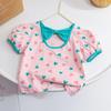 Blusa de Verano para Niña de Manga Corta 2026 Estilo Coreano Nueva Moda Versátil con Lazada Cuello Redondo Mangas Abullonadas Tendencia