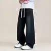 Jeans de Moda Otoño 2026 Estilo Americano Desgastado Lavado con Cordón Cintura Elástica para Hombre, Corte Holgado, Pantalones de Pierna Ancha Versátiles de Moda