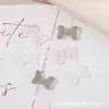 Jóias de unha de arco explosivo resina tridimensional pequeno arco diy decoração de unhas acessórios Joker atacado