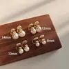 Brincos de Pressão Shijia Pérola Luz Forte Brincos Espiral Anti-Mosquito Estilo Popular Novo 2025 Brincos Elegantes de Luxo Leve Retrô