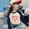 Camiseta Base Manga Longa Infantil Outono Inverno 2025 Nova Super Fofa para Meninas Mais Velhas Blusa Térmica Espessa