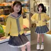 Traje Azul Marino Estilo Academia para Niñas 2026 Primavera Nuevo de Moda Niños Grandes Celebridad de Internet Más Vendido Suéter Amarillo Crema y Falda Plisada