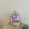 Chegada Nova Primavera 2026 Design de Nicho Fashion Versátil para o Dia a Dia Bolsa Transversal Feminina Rosa Estilo Motociclista Bolsas de Mão de Ombro