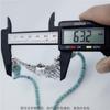 Colgante de collar de hueso de vaca Longjiang, Proceso de pintura al aceite frotado blanco niebla, Producción de atracciones turísticas y recuerdos personalizados