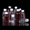 Venta al por mayor 100 200 ml mililitro botellas de plástico botellas atrayentes para pesca botellas PET para dispensar líquidos alcohol agente acuoso botellas graduadas