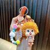 Llavero de Chica de Cabello Rizado Colgante para Mochila Pareja Muñeca de Peluche de Cabello Rizado Colgante Máquina de Peluches Pequeños Regalos Al Por Mayor