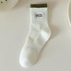 Calcetines blancos para mujer, primavera y otoño, calcetines de media pantorrilla, color sólido, combinan con todo, calcetines de algodón con letras, calcetines deportivos largos modernos ins al por mayor