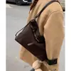 Bolsa de Camurça Personalizada para Mulheres 2025 Nova Tendência Moda Estilo Universitário Bolsa Tote Grande Capacidade Bolsa Multifuncional Mochila