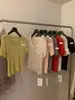 Top de lana de punto hueco de alta gama estilo francés más vendido para mujer, nuevo modelo de verano, corte ajustado y diseño único