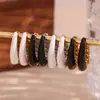 Moda Europea y Americana Sencillos de Alta Gama Pendientes de Acero de Titanio Acero Inoxidable Chapado en Oro de 18K Forma de Pera Roscados Goteo de Aceite Pendientes Pequeños para Mujeres