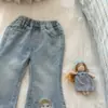 Roupas de Outono para Meninas Calças Calças Flare Estilo Coreano Novos Calças Compridas Cartoon Infantis Jeans para Bebês Conjuntos Tendência