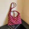Bolsa casual de lunares de alta calidad para mujer 2026 nueva bolsa de mano de gran capacidad versátil para ir al trabajo bolsa de un solo hombro para el antebrazo