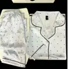 Nuevo conjunto de pijama de primavera y otoño para mujer, de seda helada con mangas largas para verano, estampado de estrellas, adecuado para usar al aire libre, en casa, de manga larga y pantalón largo