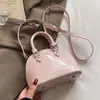 Bolsa de concha portátil de estilo europeo simple casual de venta al por mayor de primavera y verano, bolso de mensajero de cuero encerado de moda, todo para el trabajo