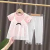 Nuevo Conjunto de Ropa de Verano para Bebé 2025 Estilo Coreano Mangas Volantes Pantalones Cortos Conjunto de Dos Piezas para Niñas de 0 a 5 Años Conjunto Moderno de Manga Corta