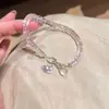 Pulseira Estrela Rosa Translúcida Doce para Mulheres, Design de Nicho de Luxo Leve com Sensação de Alta Qualidade, Adequada para o Dia a Dia