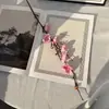 Simulación ramas de flor de ciruelo flor de membrillo de invierno flor de plástico ramo falso decoración china para el hogar decoración de jarrón para sala de estar venta al por mayor de fábrica