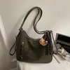 Bolsa Feminina Nova Estilo Coreano Vintage Moda Primavera 2026 Bolsa de Ombro para o Trabalho Bolsa de Mão de Nicho Bolsa Tote Vintage