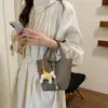 Bolso de mujer 2026 nuevo modelo, bolso de mano casual para el día a día, bolso de hombro y bandolera versátil y a la moda, bolso tipo cubo de nicho texturizado