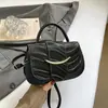 Bolso texturizado estilo coreano, nuevo bolso de hombro de moda otoño 2026, versátil, bolso de mano cruzado simple y elegante