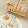 Pendientes de moda con colgante de cuentas redondas chapadas en oro de acero de titanio de estilo retro europeo y americano, collar y pulsera de gran sentido.
