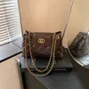 Bolso de mano para mujer 2026 verano nuevo retro con cadena y patrón de diamantes con cierre de candado, bolso cruzado cuadrado pequeño versátil para el trabajo