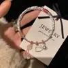 Pulsera con Colgante de Campana y Cuerda Rosa Estilo Gatito para Mujer, Pulsera con Campana de Diseño Juvenil Elegante