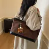 2026 Pingente Casual Simples Nova Bolsa de Compras Grande Capacidade Moda Personalizada para Outono e Inverno Bolsa Tote de Mão ou Ombro para Mulheres