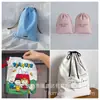 Bolsas de lona crua com cordão para atacado, adequadas para guardar colecionáveis, joias e como embalagem para velas, itens perfumados e outros acessórios.; também usado como sacos de armazenamento e à prova de poeira