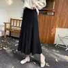 Novo vestido de tricô, modelagem solta, comprimento médio, saia evasê, barra larga, adequado para usar como peça externa no outono e inverno
