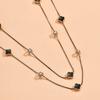 Cadena para suéter de cristal europeo y americano, trébol de cuatro hojas multicapa apilable, collar largo, cadena para suéter, moda femenina de otoño e invierno, combinable con todo