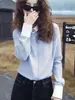 Elegante top de estilo francés con un toque de lujo ligero y alta gama, adecuado para ocasiones importantes, una camisa a rayas única y hermosa para mujeres en primavera