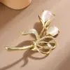 Broche de alta calidad, sentido de nicho, lujo, incrustado con circón, ojo de gato, temperamento femenino, corsage para abrigo, pines de ropa exquisitos, accesorios