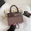 Bolso de Hombro de Moda Transfronterizo 2025 Nuevo Moda de Verano Piel Suave Bolso Kelly de Gama Alta Bolso Cruzado de Mano para Instagram
