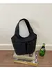 Bolsa de mão transfronteiriça 2026 verão nova bolsa de tecido de nicho estilo coreano simples versátil bolso duplo leve casual bolsa de balde