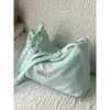 Bolso de lona casual de nicho, bolso de hombro de nailon, bolso cruzado deportivo, bolso de retazos versátil y elegante para el día a día