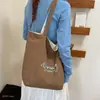 Bolsa de mano de lunares coreana de doble cara, gran capacidad, modelo nuevo, bolso de hombro para el día a día, para ir al trabajo, versátil, estilo japonés para mujer, bolso de mano de verano 2026