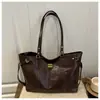 Bolsa Bolsa de Grande Capacidade Bolsa Feminina 2025 Nova Moda Bolsa de Ombro Nicho Popular Commuter Retrô Transfronteiriça Tote Bag