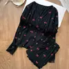 Pijama de malha canelada com estampa total para primavera, verão e outono para mulheres, com mangas compridas, cardigã de seda gelada, modelagem solta para relaxar e um conjunto de desenho animado moderno.