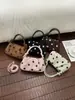 Bolsos de diseñador únicos para mujer 2026 nuevo bolso de moda de lunares estilo coreano elegante versátil para hombro y bandolera