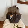 Bolso vintage transfronterizo para mujer, gran capacidad, nuevo modelo 2026, diseño de nicho, bolso de hombro elegante para el trabajo y los desplazamientos, bolso tote