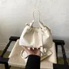Bolso de cordón nuevo estilo vintage de cuero suave coreano para mujer, bolso de hombro para axila de nicho de alta gama para el trabajo
