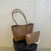 Bolso de mano con patrón tejido único para mujer, nueva colección de otoño 2026, bolso tote retro para el día a día, bolso tipo cubo grande para el hombro