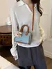 Bolsa Boston Color Block para Mulheres 2026 Nova Bolsa Cilíndrica de Jeans Bolsa de Ombro Único Transversal Estilo Retrô de Alto Padrão Coração de Menina