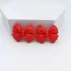 Resina dibujos animados corbata de moño moño DIY funda de teléfono tocado accesorios para el cabello material Mate Plano grande flor de zapato accesorios