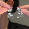 Pendientes de cola de pez dorados de estilo metálico con aguja de plata S925 para mujer, ligeros, de lujo, de verano, de alta gama, con explosiones.