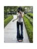 Jeans acampanados de tiro bajo color azul oscuro estilo americano para mujer, adelgazantes, elásticos, versátiles, pantalones de largo completo para primavera y otoño